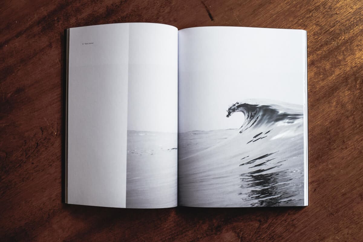 Book on a wooden table book-18@2x